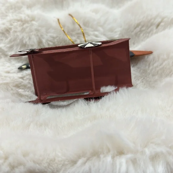 Mackenzie-Childs Penguin Sledding Ornament - Picture 4 of 4